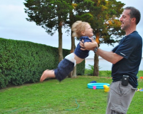 My friend mostly froze this wonderful moment while I was spinning my son last summer on vacation. I love it. Who cares if it’s a little blurry?