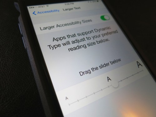 My new iPhone, sporting a black Tech21 case proudly displays how to increase its text size using iOS 8.  (Yes, some of us can’t pick out every period in a paragraph as accurately as we used to…)
