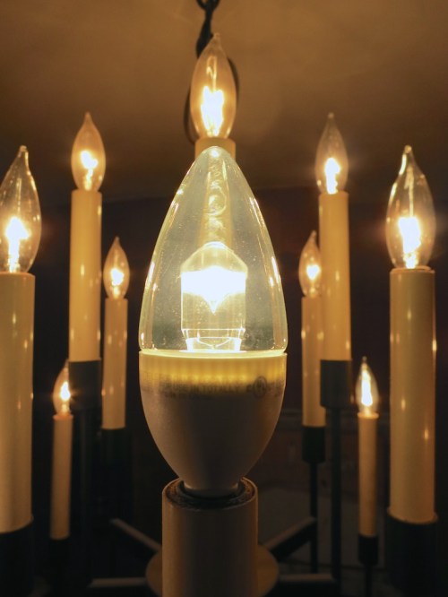 One of these bulbs is not like the other. One of these bulbs just doesn’t belong… The good news is my father’s fifty-year-old chandelier has just entered the 21st century… invigorated with LED bulb tech.
