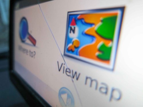 This is what happens when you drop your car’s GPS navigation unit on the pavement. The cracked glass is the least of its problems. So now what…?