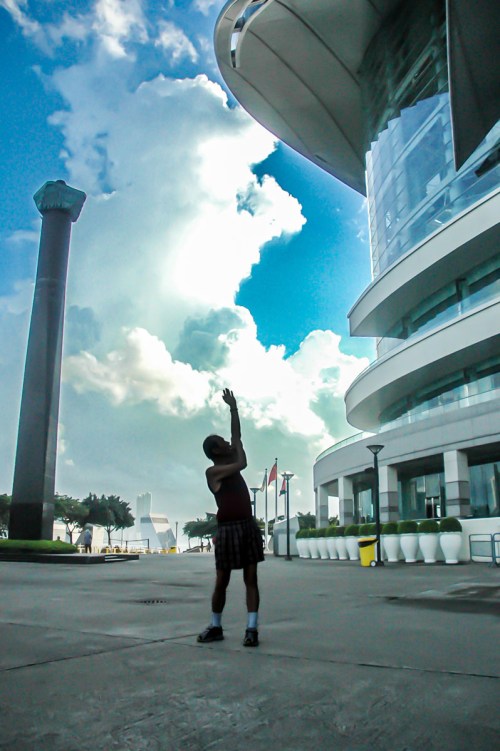 Man's morning stretch in Hong Kong