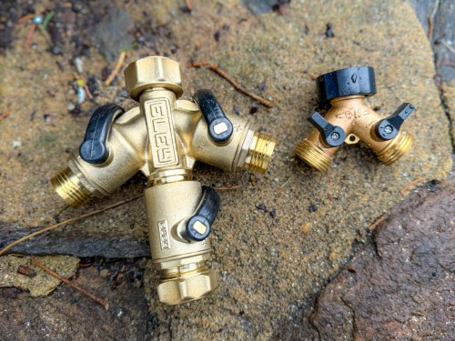 ELEY lead-free brass garden hose 2-way splitter placed next to a standard hose splitter